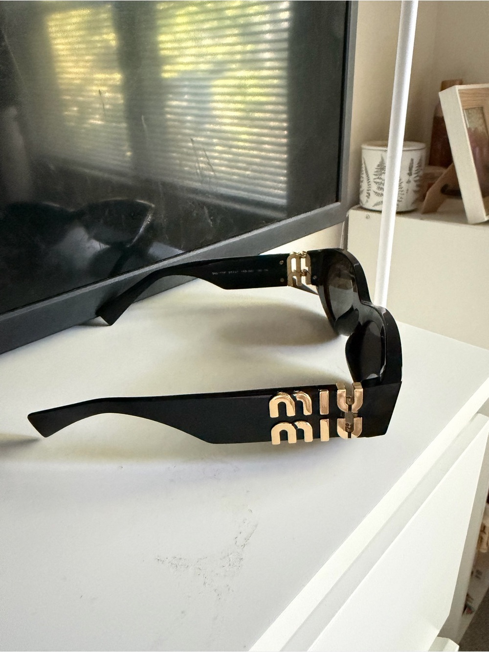 Miu Miu Black Sunglasses with Gold Logo Accent - Picture 7 of 10